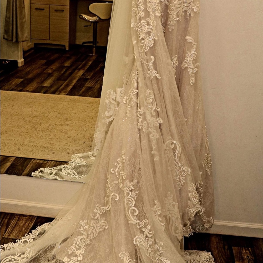 My beautiful wedding dress only worn once for about 3 hours